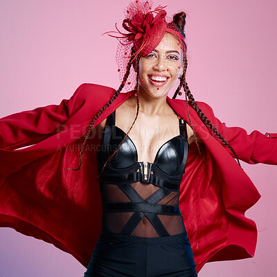 Buy stock photo Punk, rock and woman with creative fashion, metal culture and happy with designer identity against a pink studio background. Leather style, edgy and portrait of a funky clothes model with a smile