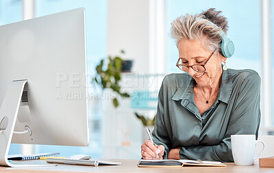 Buy stock photo Senior woman, headphones and writing in office or happy planning motivation with notebook and music. Elderly person, smile and business happiness, employee working or relax with online podcast