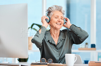 Buy stock photo Office music, relax and business woman with audio headphones, podcast and streaming radio in an office at work. Worker freedom, corporate smile and senior employee listening to a song on company wifi