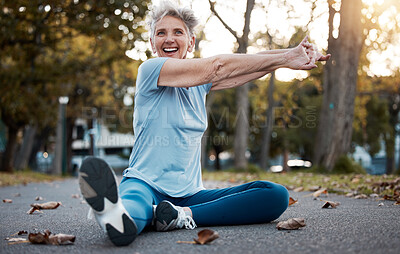 Buy stock photo Fitness, park and stretching senior woman on ground in workout, training and energy for body wellness, outdoor healing and mental health. Elderly athlete, sports warm up and cardio exercise in nature