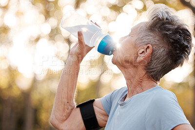 Buy stock photo Senior woman runner, drinking water and workout in park, summer and training for health, cardio and fitness. Elderly running, exercise and hydration with water break for healthy body, mind or muscle