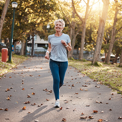 Buy stock photo Park, running and fitness with a senior woman outdoor for cardio or endurance training in summer. Sports, exercise and health with a mature female pensioner outside for a run during retirement