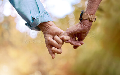 Buy stock photo Retirement, senior couple and holding hands for love, romance and bonding together. Romantic, hand gesture and loving for relationship, marriage and support for anniversary, retired and healthcare.