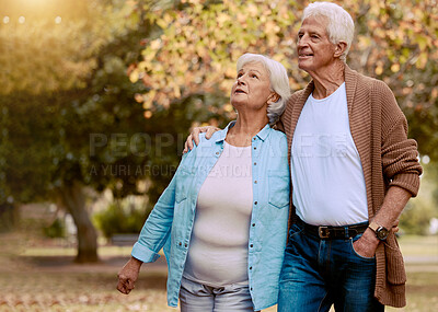 Buy stock photo Senior couple walking in park for retirement, love and care together to enjoy quality time, marriage and relationship. Old man, woman and elderly people in autumn garden, nature and relax outdoors 