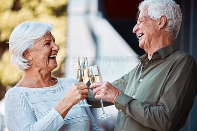 Buy stock photo Senior couple, champagne and toast to celebrate anniversary in a loving relationship at home. Love, care and alcohol cheers with retired husband and wife celebrating joyful retirement outside