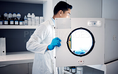 Buy stock photo Man, scientist and laboratory autoclave equipment for medicine temperature control, medical research storage or chemical mixing. Healthcare worker, science and centrifuge machine for dna engineering