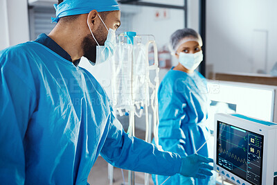 Buy stock photo Surgery, team and checking machine while preparing for medical procedure in a hospital with surgeons. Doctor, heart machine and collaboration for surgical treatment in a healthcare consultation 