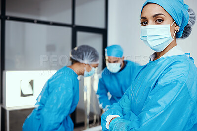 Buy stock photo Medical, surgeon or doctor in scrubs and face mask in hospital with staff working during covid virus crisis for health and wellness with safety. Portrait of a woman with arms crossed for healthcare
