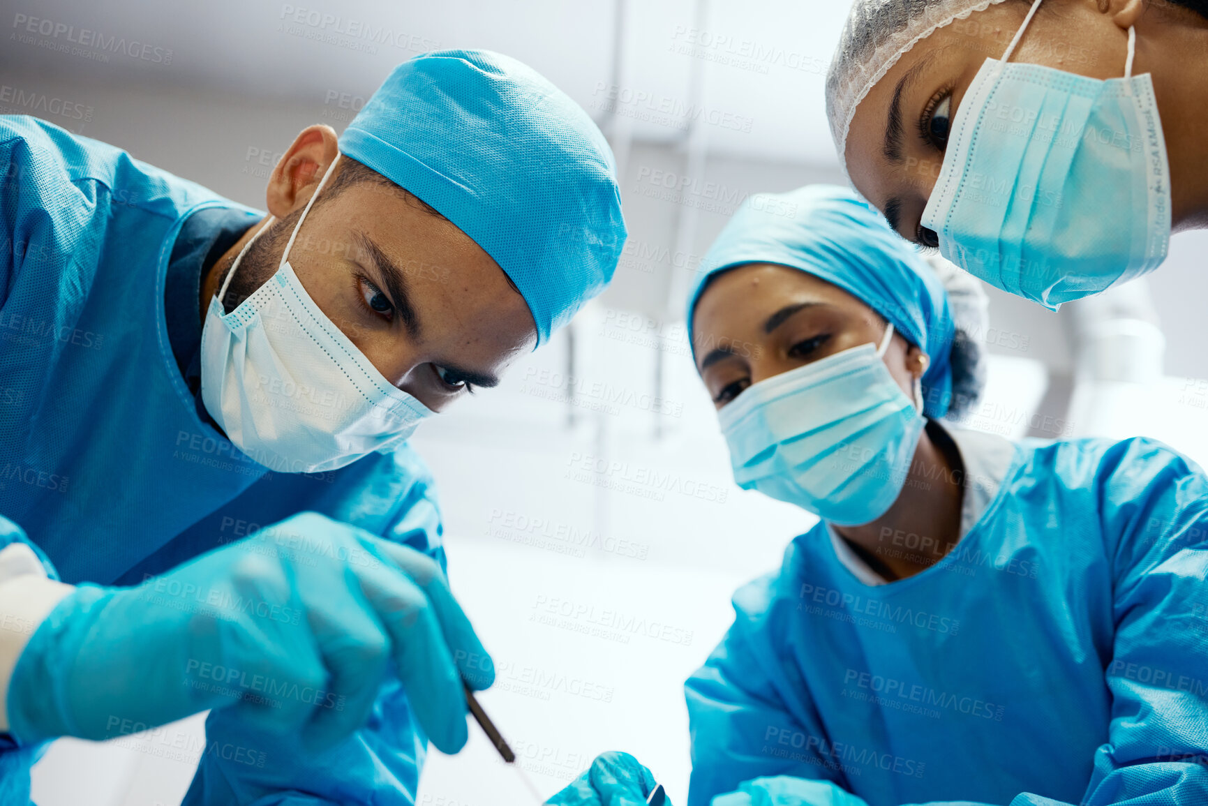 Buy stock photo Surgery, team and hospital with surgeon support from medical staff in an operating room. Operation, collaboration and healthcare or doctor teamwork in emergency procedure while wearing scrubs