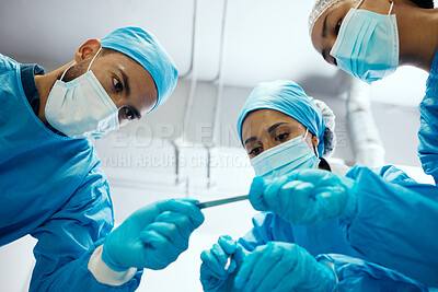Buy stock photo Mask, staff and medical for surgery in hospital, emergency room or recovery for diagnosis. Doctor, nurse or team for healthcare, heart failure procedure for patient, face cover or scalpel to operate.