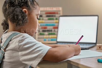 Buy stock photo Laptop mockup, online education and elearning with kid, girl and student writing test at table for zoom call lesson. Home school child studying with virtual teaching, technology mock up and internet