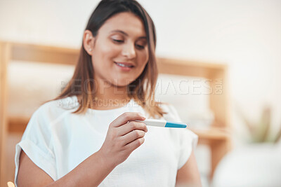 Buy stock photo Happy woman, pregnancy test and results in home for pregnant information. Lady check fertility with stick for maternity, family planning and ovulation from ivf, prenatal healthcare and medical hope 