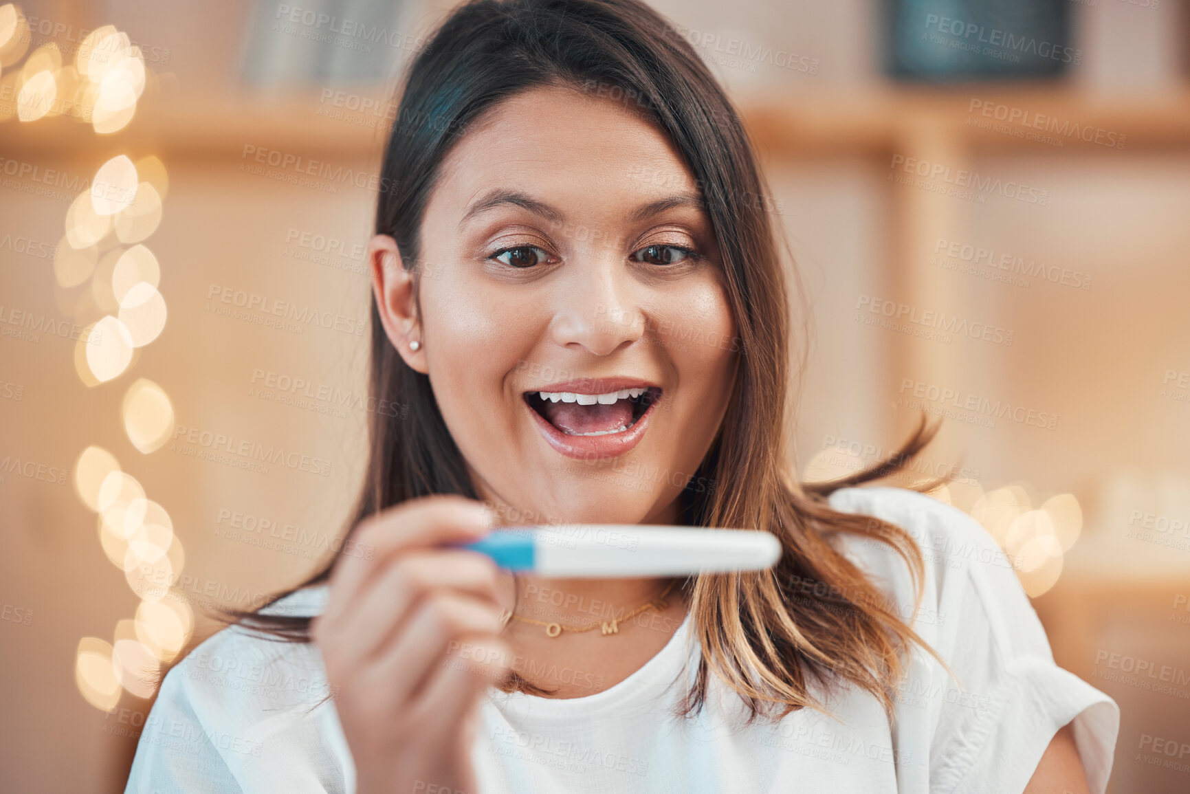 Buy stock photo Wow, excited or woman with pregnancy test results by reading a fertility stick at home with a happy smile. Face, pregnant or surprised person in maternity shocked by motherhood or future family news