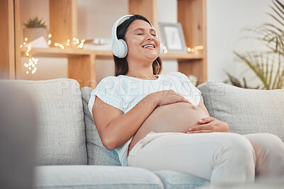 Buy stock photo Pregnant woman, relax and headphones for listening to music on sofa for healthy zen, calm and peace for wellness or soothing at home. Happy female with pregnancy tummy on living room couch to rest