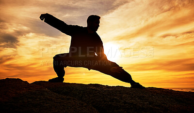 Buy stock photo Man, meditation and silhouette, training and tai chi outdoor at a beach, wellness and calm with sunset background. Male, dark and shadow with martial arts, workout and meditate for a balance mindset 