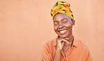 Beauty, smile and black woman, happy and face for skincare cosmetic product with orange wall. Happiness, head scarf and fashion African girl feeling soft skin texture with mockup space outdoor