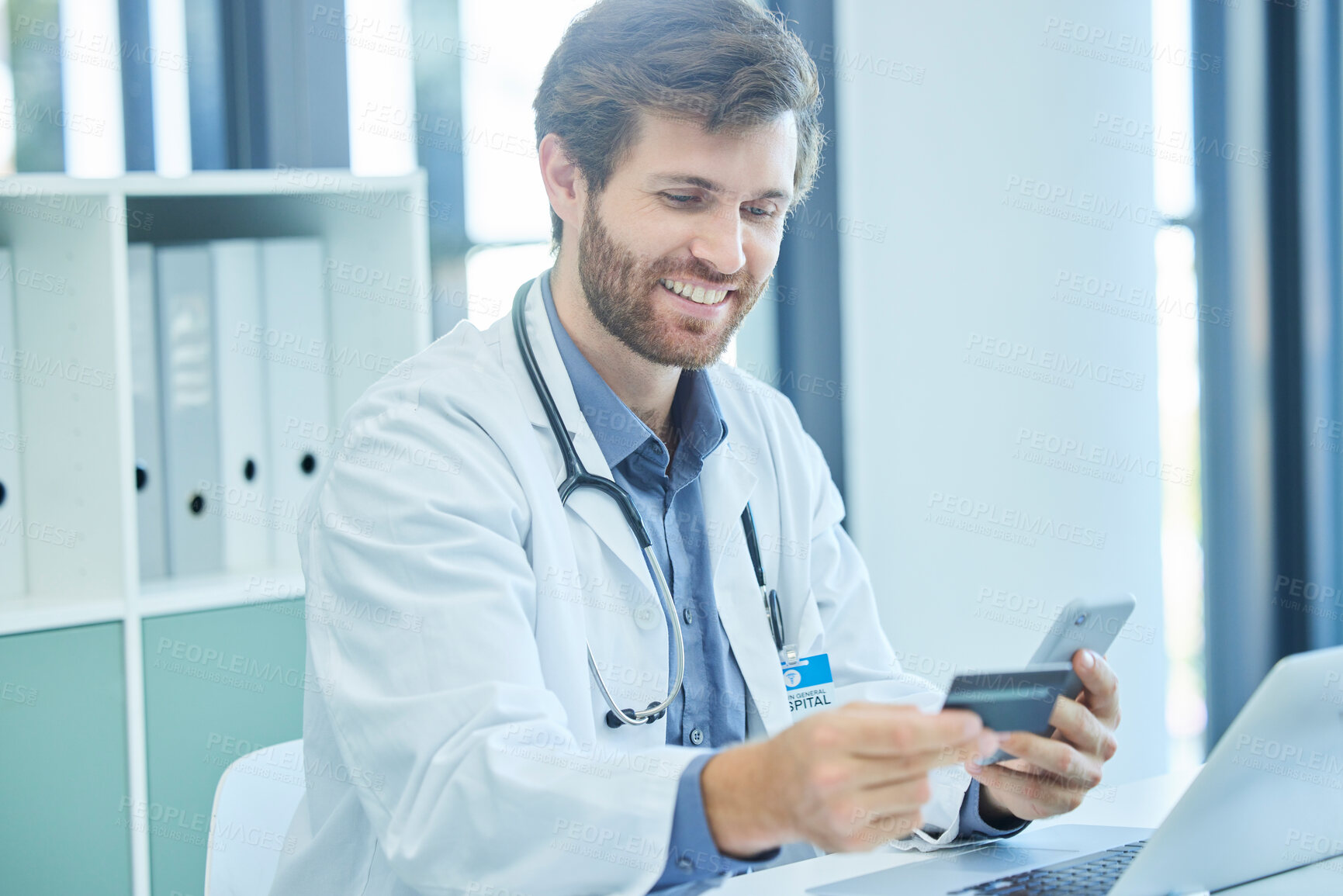 Buy stock photo Doctor, phone and credit card for online shopping, ecommerce and making payment for life insurance, healthcare and medical supplies. Happy male using technology for internet banking and investing