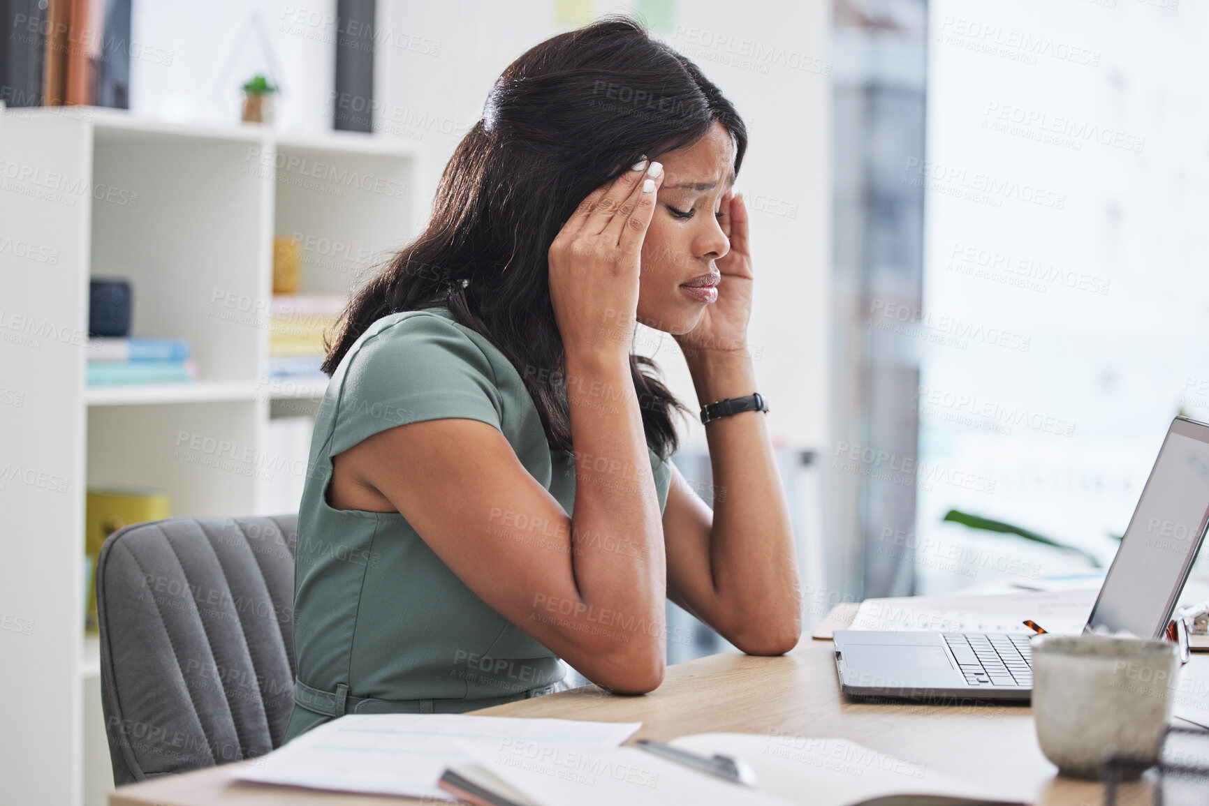 Buy stock photo Black woman, stress and headache on laptop working at the office suffering from mental health issues. African female employee sitting by computer desk in pain, burnout or anxiety at the workplace