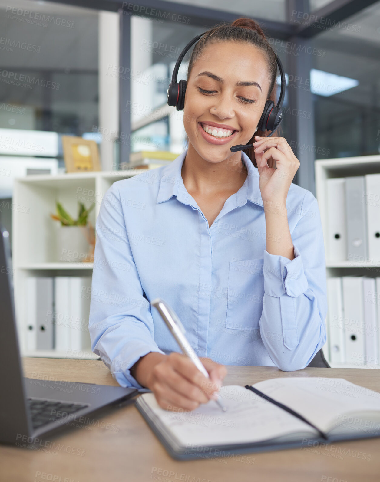 Buy stock photo Call center, woman and writing notes for customer service, telemarketing sales or consulting at office desk in agency. Happy receptionist, communication and planning in notebook, solution and telecom