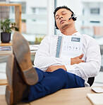 Sales man, sleeping and headset at office desk from reading annual report documents, finance paperwork or taxes. Nap, burnout and tired financial consultant exhausted from business economy consulting