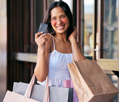 Buy stock photo Credit card, sunglasses and woman with shopping bags at mall ready to buy fashion clothing. Black Friday, sales deals and portrait of rich female from India with money and finance for retail payment.