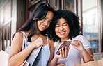 Women friends, shopping and phone in city for choice, e commerce discount or online shopping. Happy black woman, group smile and smartphone for web store, sale or ecommerce together in Los Angeles