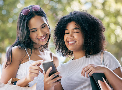 Buy stock photo Phone, shopping and black woman friends outdoor together for a retail sale or deal as a customer. Ecommerce, contact and online shopping with a female and friend using 5g mobile technology to search