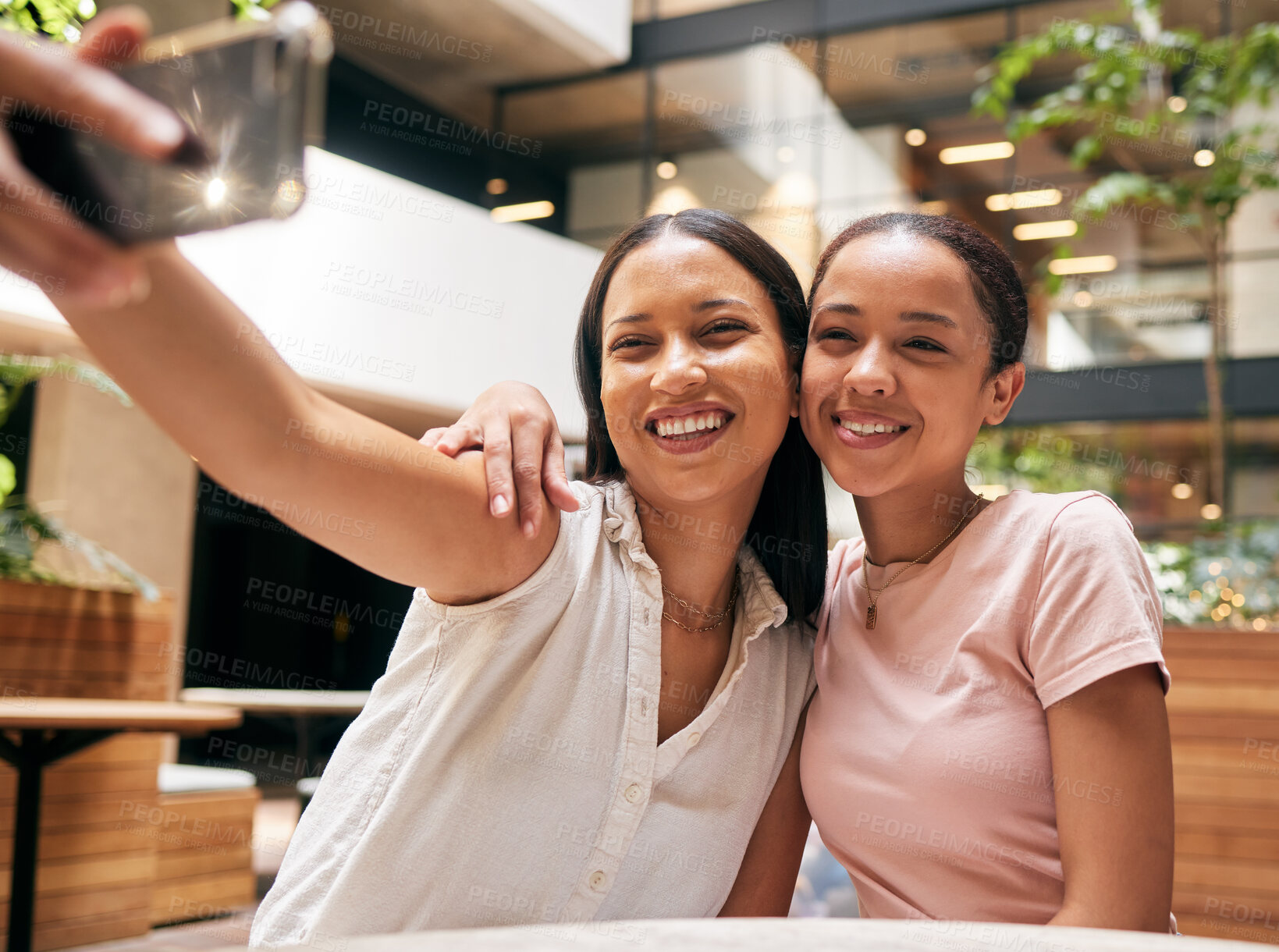 Buy stock photo Phone, friends and women taking a selfie in restaurant for social media post, social network and memories. Friendship, smartphone and happy girls take photo enjoying quality time, freedom and weekend