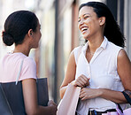 Women, bonding or laughing with city shopping bags for fashion retail therapy, sales or trending clothes. Smile, happy or fun friends and mall products, clothing carrier gift or boutique store goods