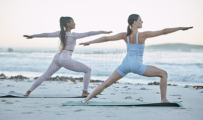 Buy stock photo Woman, friends and yoga stretching at the beach for healthy wellness, fitness or zen workout together in the outdoors. Women in morning routine, yoga class or warm up stretch on the sandy ocean coast