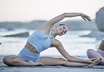 Yoga, beach and wellness woman at class stretching body for fitness and happiness in Hawaii, USA. Health, training and happy yogi girl enjoying workout on ocean sand for wellbeing lifestyle.