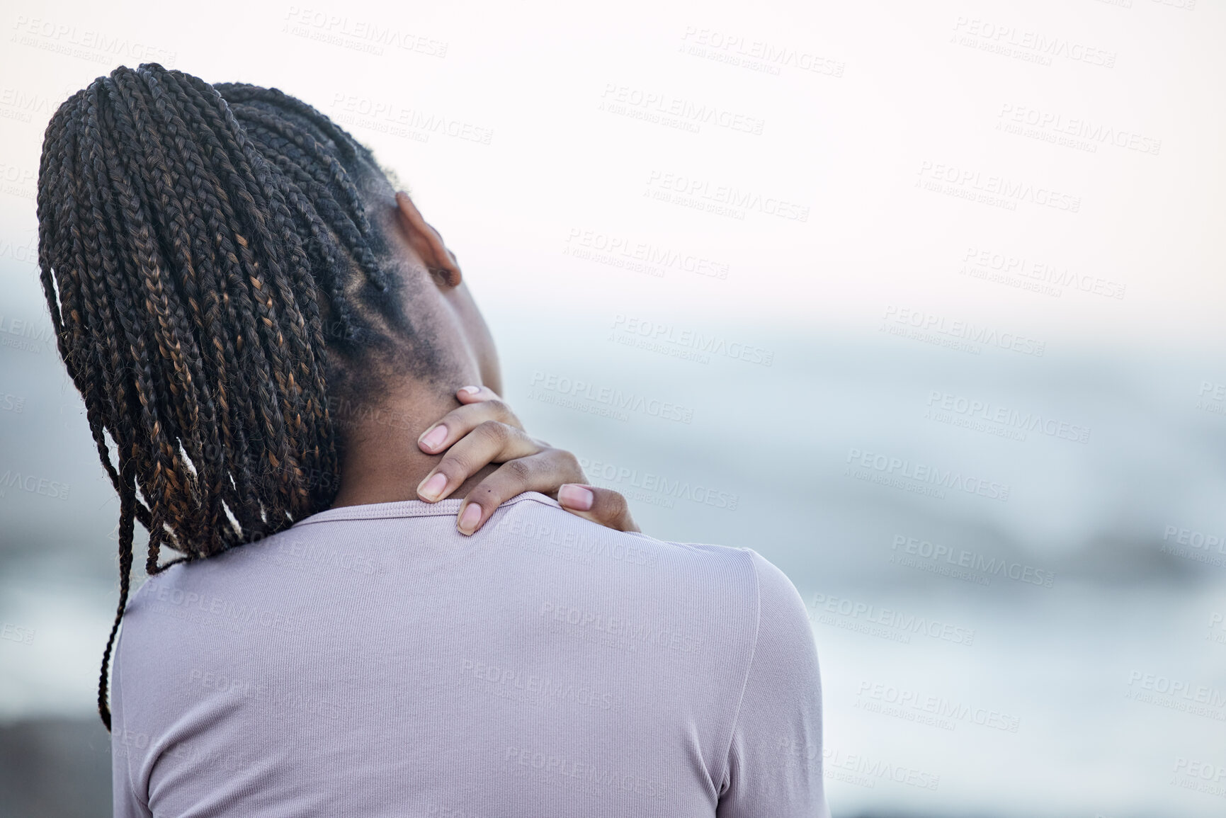 Buy stock photo Back, black woman and neck pain with stress, injury and chronic pain. Jamaican female, lady and athlete with tension in the shoulders, muscle strain and massage for healthcare, wellness or overworked