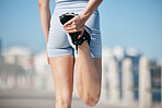 Woman, stretching legs and back view in city, street or urban road outdoor. Fitness, health and female athlete stretch or warm up before exercise, running or training outside for marathon run in town