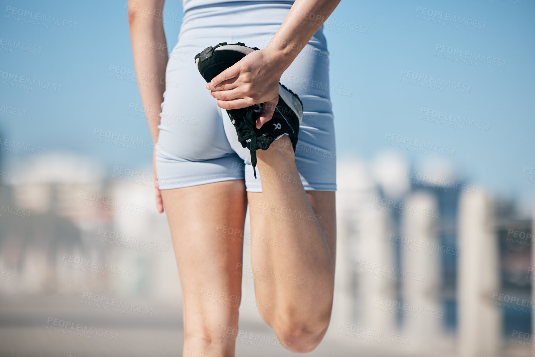 Buy stock photo Woman, stretching legs and back view in city, street or urban road outdoor. Fitness, health and female athlete stretch or warm up before exercise, running or training outside for marathon run in town