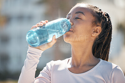Buy stock photo Drinking water, fitness and black woman in urban city with workout challenge for health, wellness and nutrition. Young sports, athlete or runner woman with water bottle for exercise, training outdoor