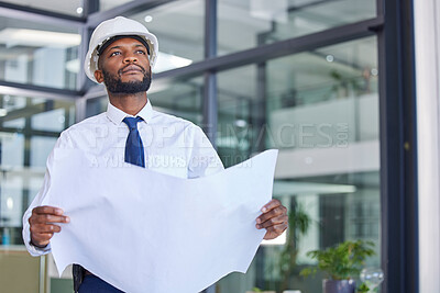 Buy stock photo Black man, architect and blueprint in construction planning, thinking or contractor at the office. African American male engineer holding project plan for industrial building, layout and architecture