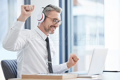 Buy stock photo Relax, music and dance with businessman and laptop for streaming, freedom and winner. Energy, celebration and online with employee listening at desk in corporate office for radio, disco or rock break