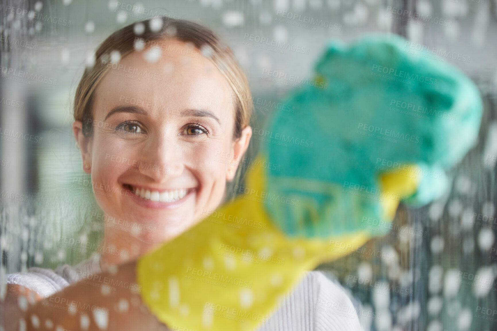 Buy stock photo Cleaning, washing and portrait of woman by window with foam, cleaning products and cloth for housework. Spring cleaning, housekeeping and happy girl wipe dirt and dust on glass window for clean home