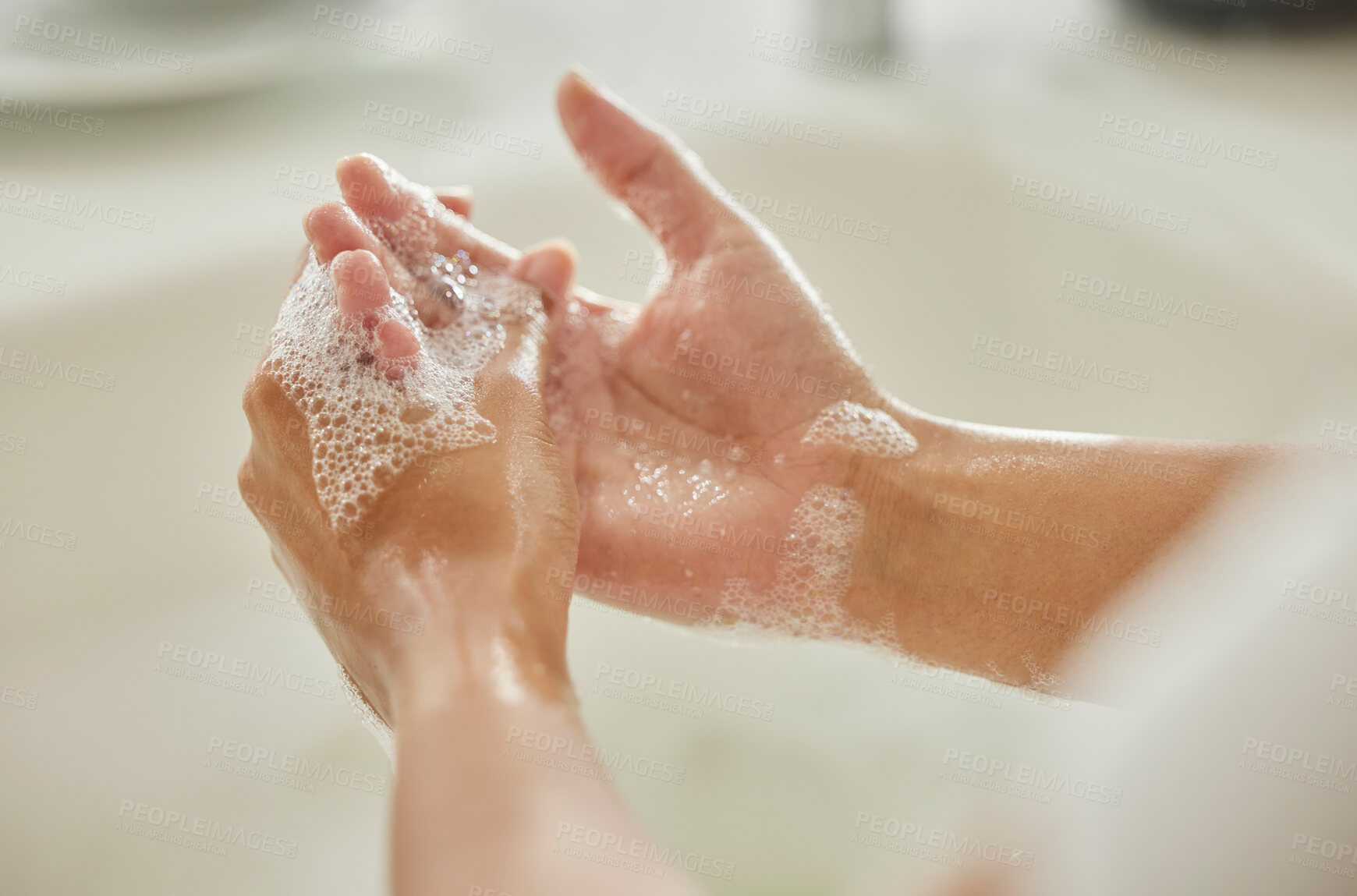 Buy stock photo Woman, cleaning and hands with soap, bubbles or water in bathroom for hygiene, healthcare or safety. Hand washing, foam and clean from germs, virus or bacteria for wellness, healthy skin or self care