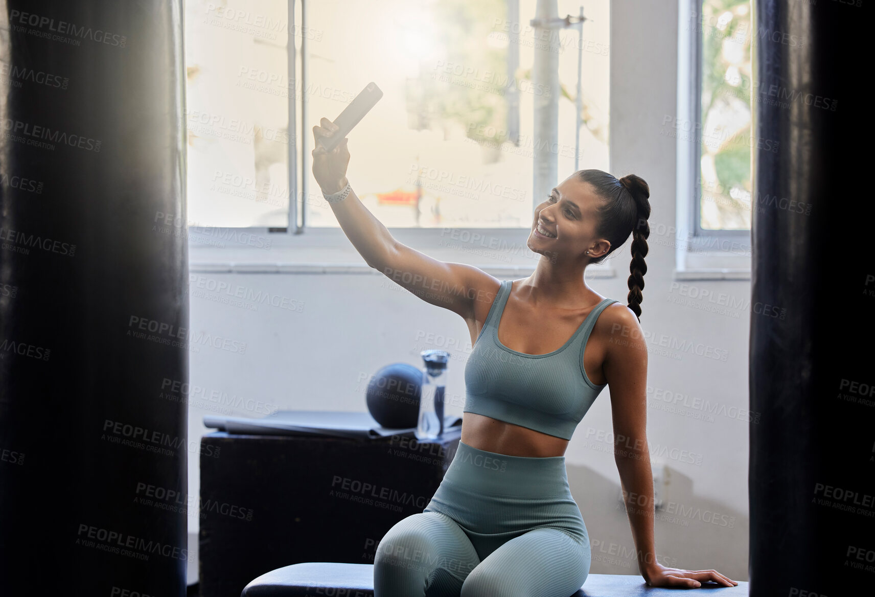 Buy stock photo Fitness, gym and woman taking selfie with phone in home studio for social media post, wellness blog and network. Health, sports and happy girl with smartphone after exercise, workout and training