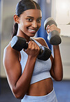 Fitness, Indian woman and dumbbell training portrait in gym for workout training, exercise motivation and healthy lifestyle. Sports wellness, muscle bodybuilder and athlete woman happy in health club