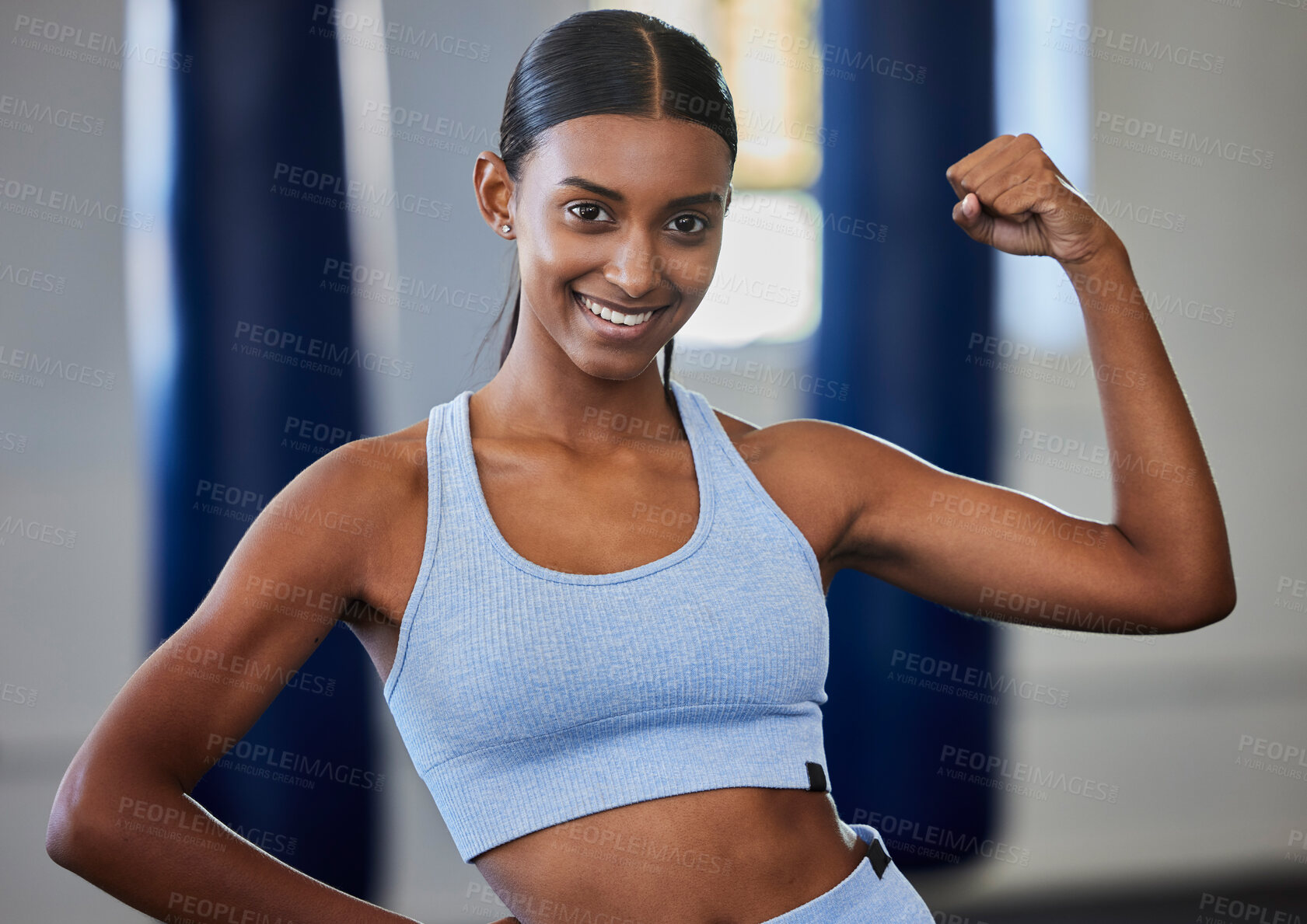 Buy stock photo Strong, fitness and muscle of woman or bodybuilder in portrait with power, motivation and energy in gym studio for training or exercise. Body goals of an Indian sports person or athlete with arm flex
