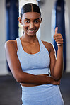 Thumbs up, Indian woman and fitness, wellness and exercise health model with positive energy in gym.  Motivation, encouragement and support for happy training workout, sports athlete and healthy goal