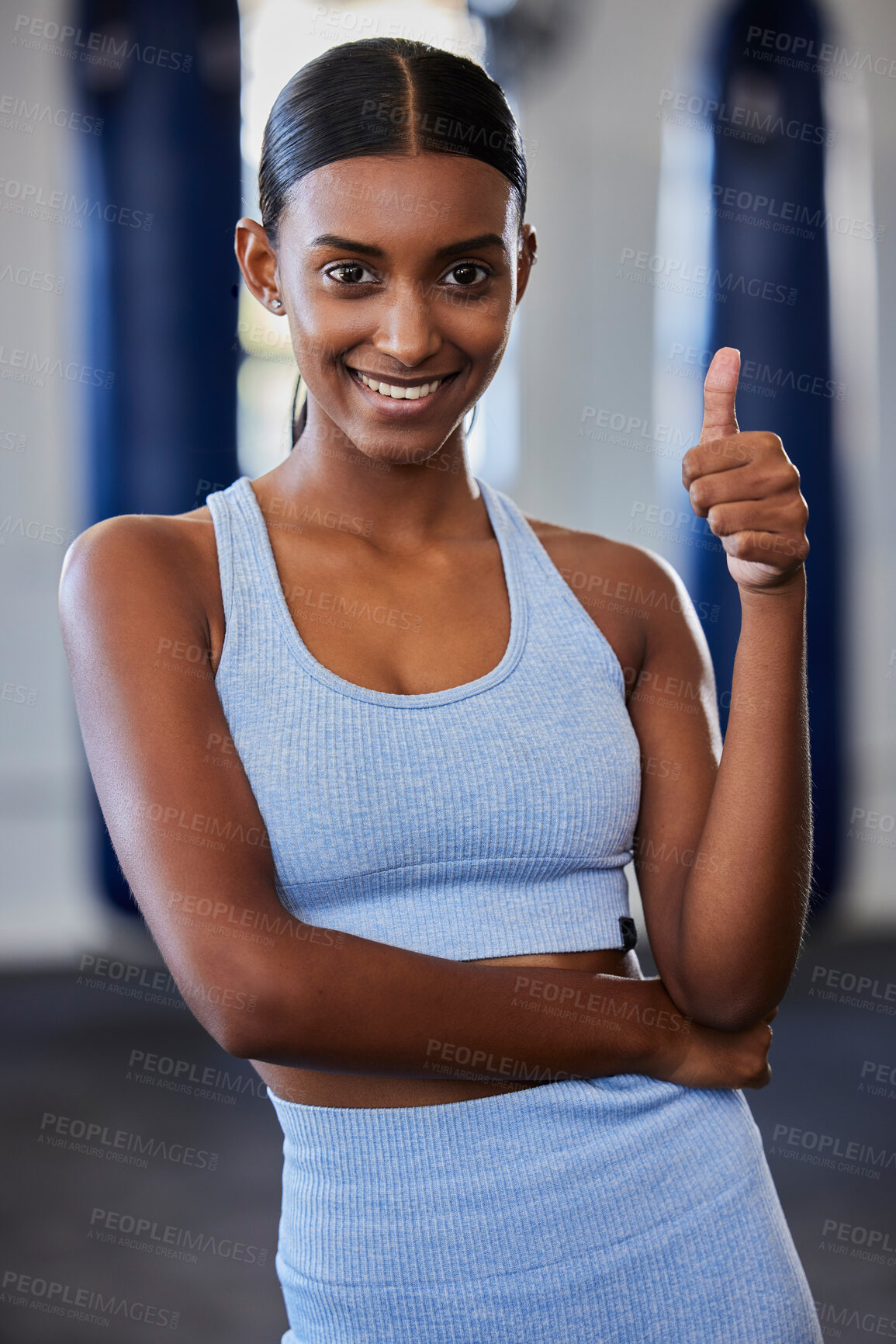 Buy stock photo Thumbs up, Indian woman and fitness, wellness and exercise health model with positive energy in gym.  Motivation, encouragement and support for happy training workout, sports athlete and healthy goal