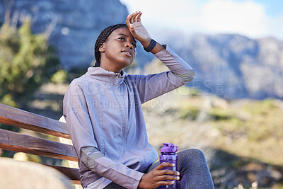 Buy stock photo Fitness, running and tired black woman on bench sweating from exercise, workout and marathon training. Sports, health and exhausted girl sitting to rest, break and relax with water bottle on mountain