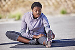Black woman, fitness and leg stretching in city streets, daily jogging and morning workout training practice. Physical activity, healthy wellness warmup and fitness, sports in road outdoor with girl