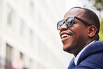 Black man, face and glasses happy in city for business travel, work commute or walking in street. African american businessman, smile and walk with sunglasses in urban town or New York traveller