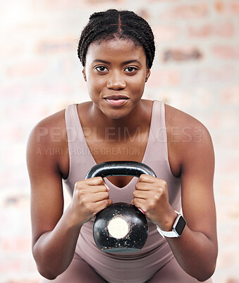 Buy stock photo Exercise, workout and black woman with kettle ball for strength, health or wellness. Sports, fitness and face portrait of female athlete from Nigeria with weight for lifting, training and exercising.