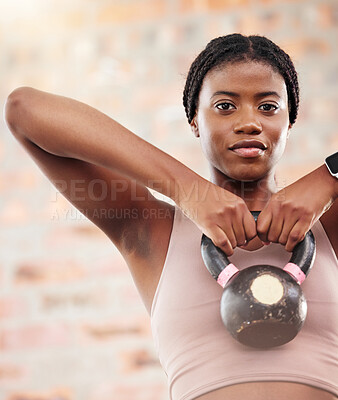 Buy stock photo Kettlebell, black woman portrait and fitness in a wellness, training and health gym for sport. Sports workout, exercise  and strong arm muscle for healthy body of a athlete with motivation and focus