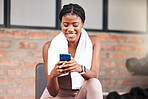 Black woman, smartphone and exercise in gym, connection and social media. Jamaican female, athlete and phone for communication, relax and break after fitness, workout and training for health or smile